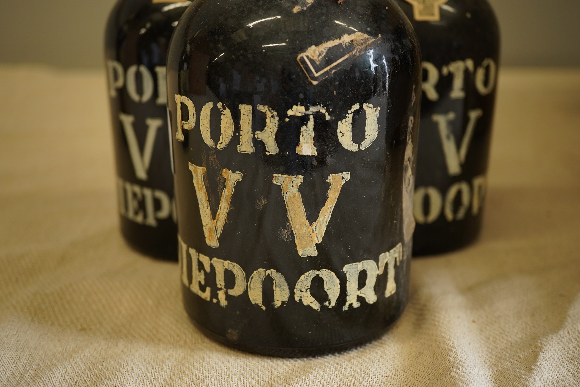 Three bottles of Porto VV Niepoort Port.
